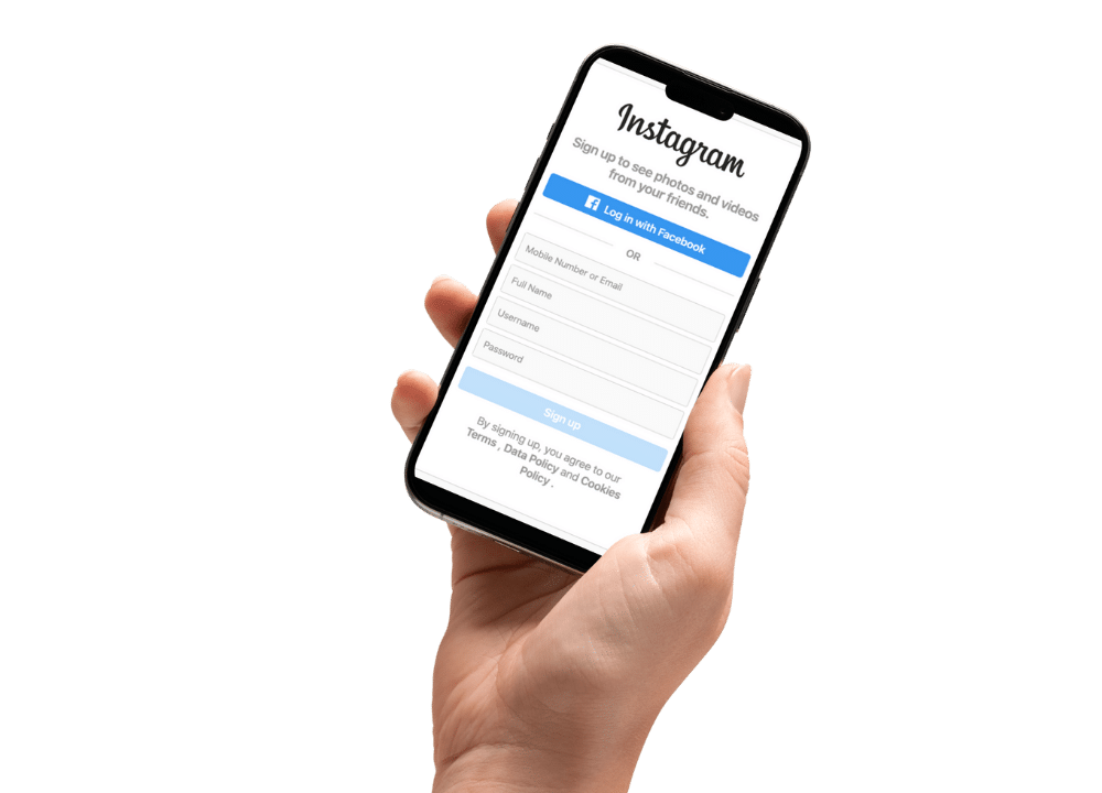 an image in the blog section of a hand holding a phone on the Instagram sign-up screen—illustrating the tip to create a new account on mobile and avoid risky desktop setups.