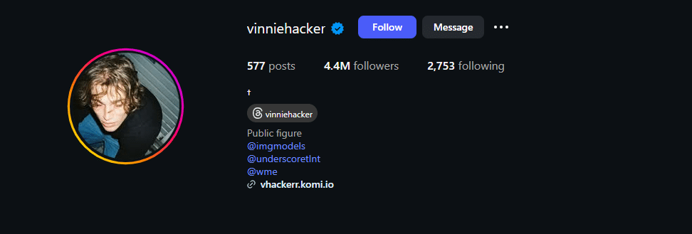 Vinnie Hacker Instagram profile with 4.4 million followers, public figure bio with modeling agency tags, curly hair close-up profile picture, links to OnlyFans and management, edgy and popular bio style for teenage boys and models.